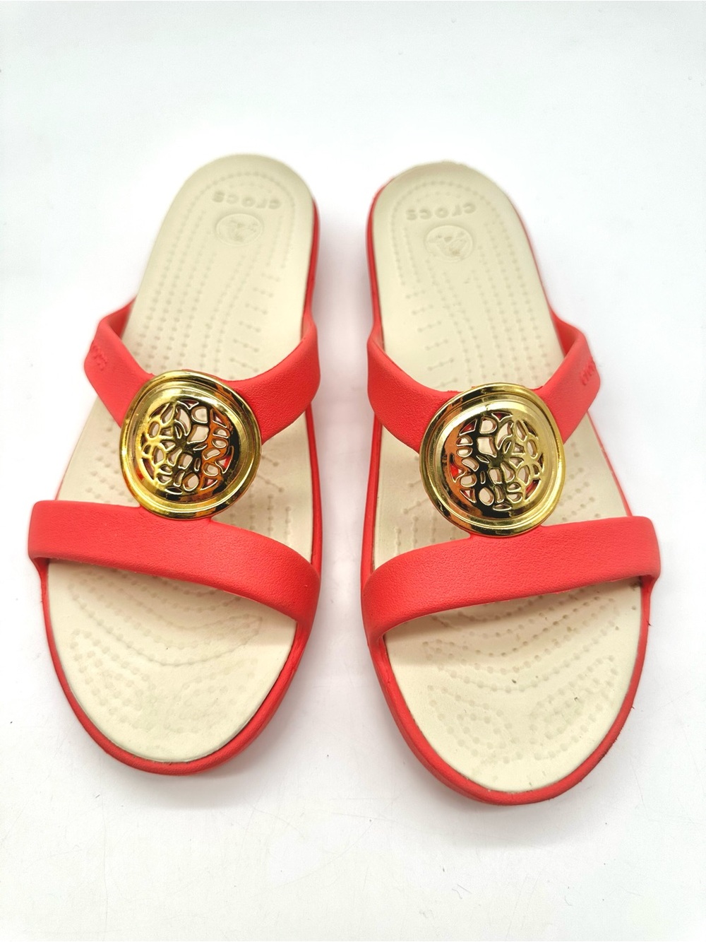 Women's Coral crocs US size 8 Slide Sandals with Gold Medallion